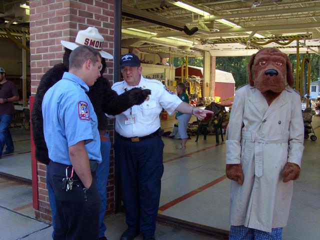 Meeting of the minds at the 2010 Open House. Member Joe Larsen, Jr., Smokey the Bear, HHVFD Cheif Dennis McDonald, McGruff the Crime Dog at the 2010 Open House