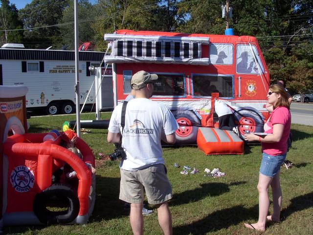 Kids enjoying the Fire Engine Moonbounce at the 2010 Open House